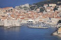 Aerial view of Old Town (Stari Grad), City Walls and a port for tourist ships by Adriatic Sea, Dubrovnik, Croatia Royalty Free Stock Photo